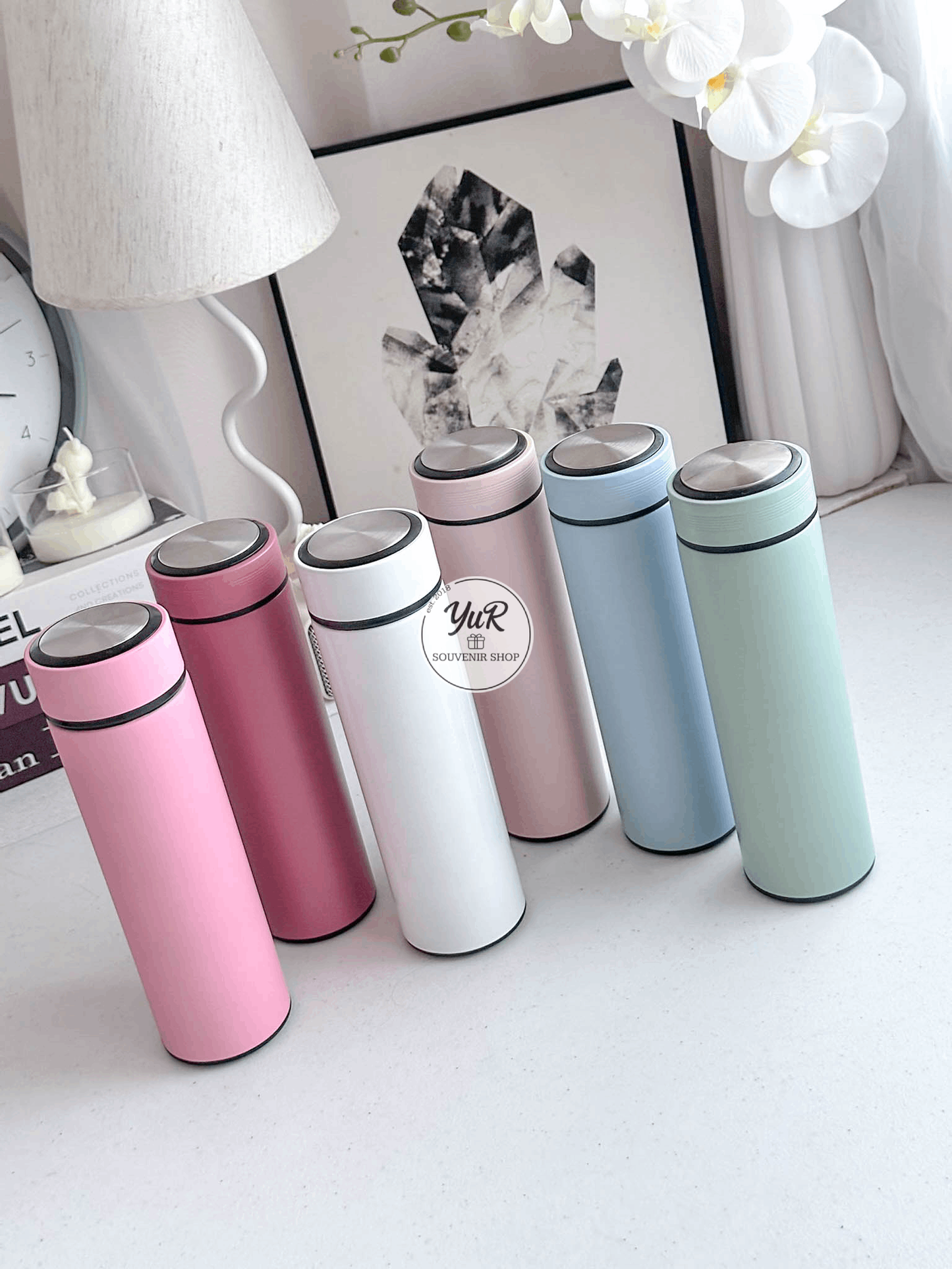 Tumbler with wrapping